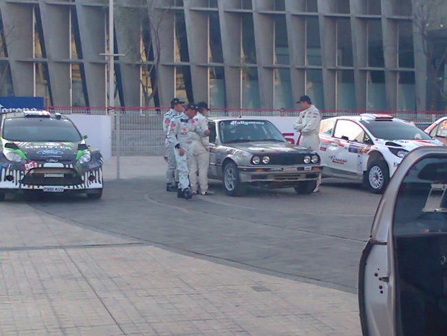 Pro Racers Giving Caswell's BMW a Once Over